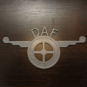 Эмблема DAF с рессорами
